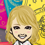 �߂���