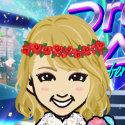 �߂���
