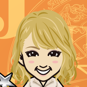 �߂���