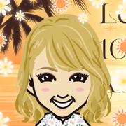 �߂���