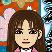 ���߂���